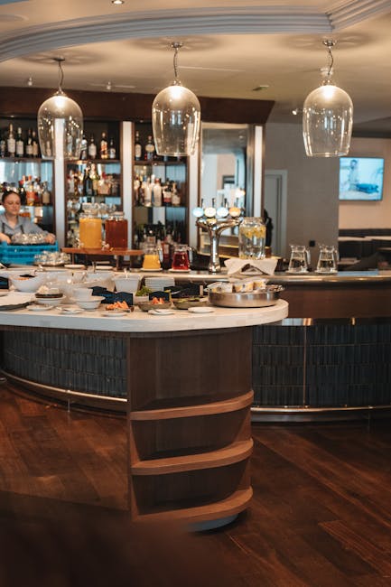 Bar area with premium beverages and elegant seating
