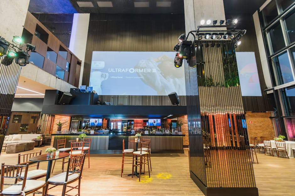 Main hall of FluxHall Events with elegant lighting and entertainment setup